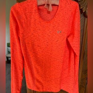 Two women’s Under Armour tops